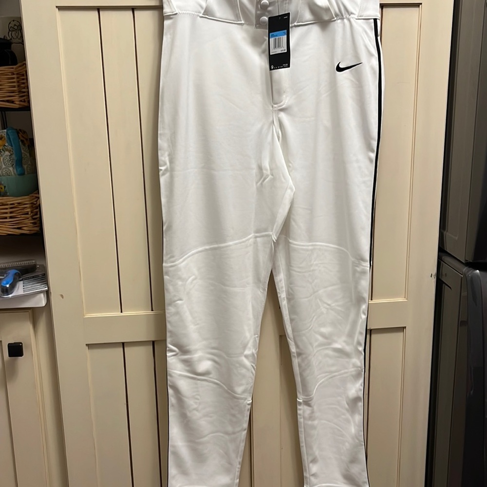 Brand new men’s Nike baseball pants w black piping